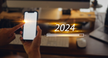 New Year 2024 celebration concept,Smartphone and work desk at home background