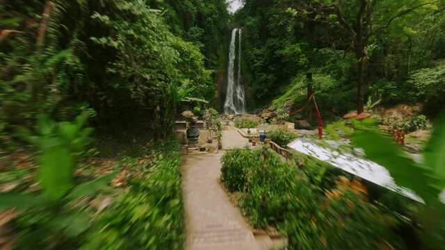 GitGit waterfall in Bali, Indonesia. Fpv drone Aerial view on the waterfall in jungle. Travel - video