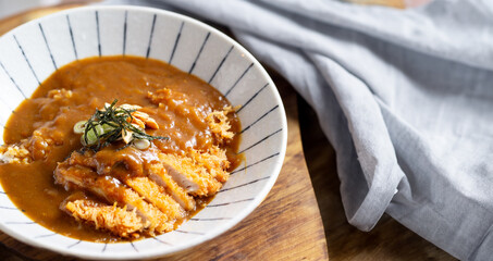 Pork cutlet with delicious Curry sauce on a bowl