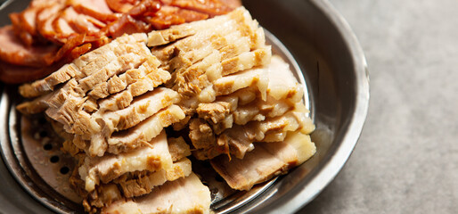 Boiled pork on a plate, Korean food 