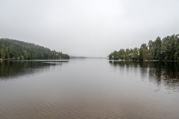 Lake Ragnerudssjoen in Dalsland Sweden beautiful nature forest pinetree swedish houses
