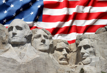 The four presidents at Mount Rushmore National Park in South Dakota with USA flag on background - obrazy, fototapety, plakaty