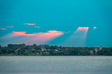 The sun goes down over a lake