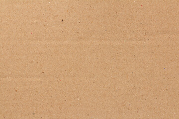 Cardboard sheet texture background, detail of recycle brown paper box pattern.