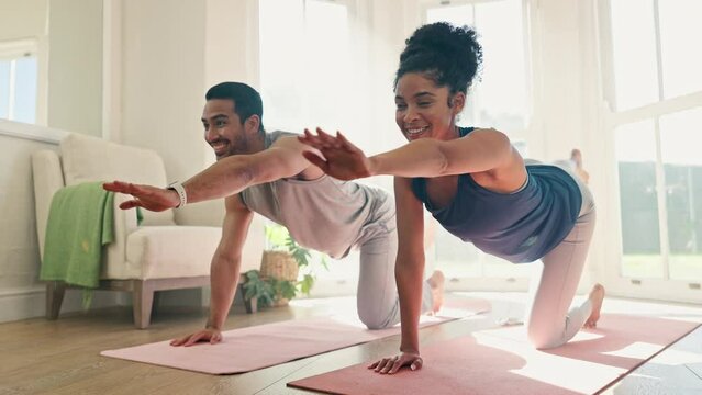 Couple, yoga and balance, body and fitness at home with bonding, workout together with stretching and healing. Self care, health and wellness, man and woman in living room, pilates and relationship