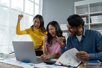 Happy young asian businessman Express joy together and celebrate the success of starting a business. Creative team brainstorming meeting, business partners or teamwork concept of office colleagues.