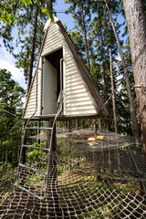 a hanging house on a web net inside the forest at Masungi Georeserve 
