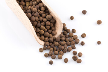 Wooden shovel with black peppercorn