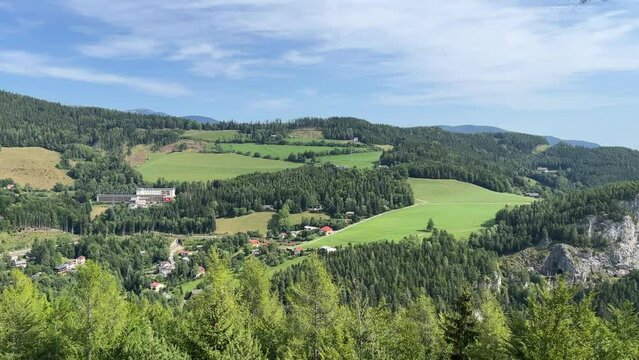 Semmering Railway World Heritage Unesco Site in Austria filmed from above with a drone in 4K surrounded by forest. Semmering Eisenbahn in &Ouml;sterreich
