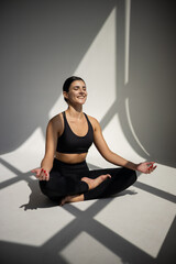 Fototapeta premium Woman doing yoga exercises.Yoga and fitness concept
