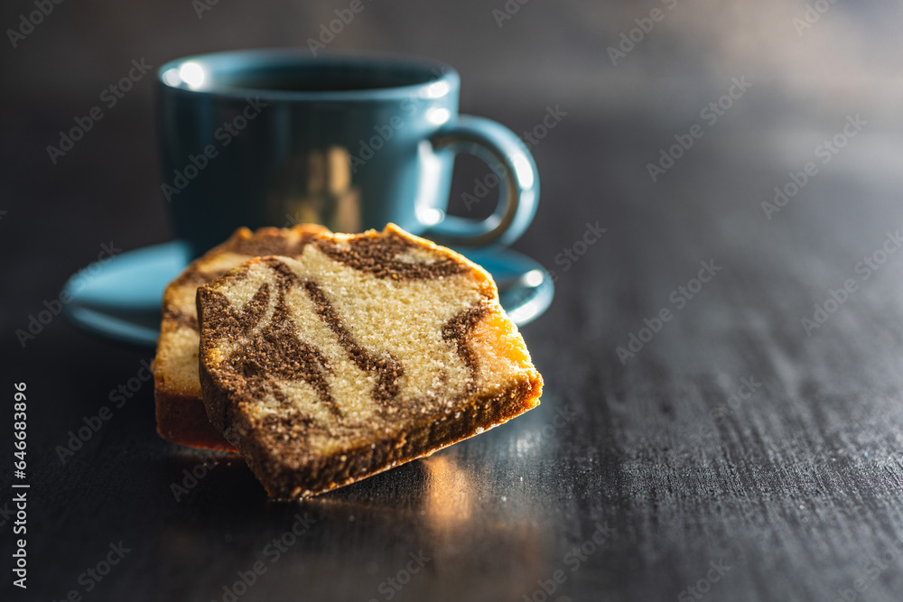 Poster marble sponge cake and coffee cup. cake with cocoa and vanilla taste.