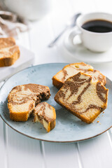 Marble sponge cake. Cake with cocoa and vanilla taste on plate.