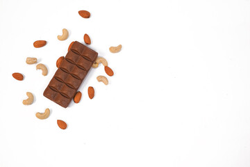 Chocolate with almonds on white background