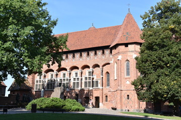 Fototapeta na wymiar Zamek Krzyżacki w Malborku, największy na świecie, Polska, gotycki, ceglany,
