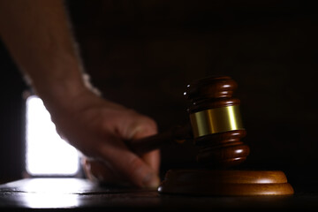 Judges gavel on wooden desk. Law firm concept.