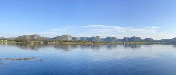 Panoramic view on norway coast in a fjord 