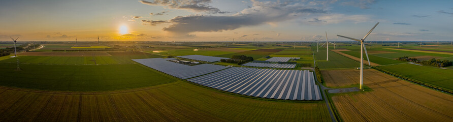 Sustainable installation of  photovoltaic solar power plant and wind turbine farm on agricultural...