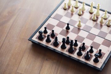 Hand playing game of chess, competition, strategy, battle, play