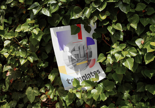 Mockup of customizable A2 vertical poster in hedge