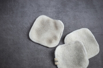Dirty cotton pads with grey background