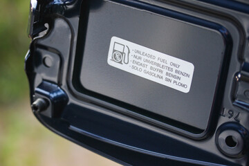 Fuel sticker in the filler door of a new vehicle