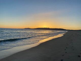 Sunset at the beach with orange sky