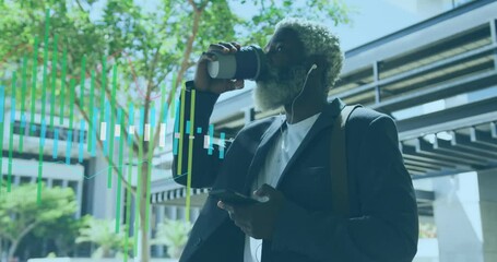Animation of statistical data processing against african american man drinking coffee at office - Powered by Adobe