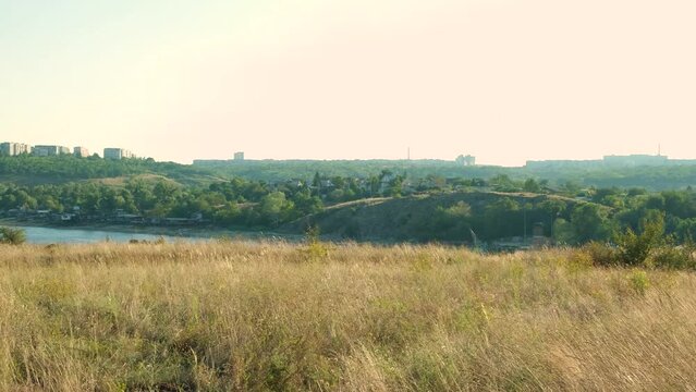 View of the Dnieper River in Ukraine. Beautiful nature and summer field.