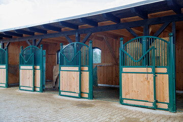 New horse stable facade in blue colors