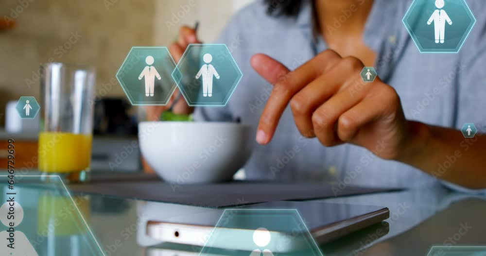 Aufkleber animation of multiple profile icons floating against mid section of a woman using smartphone at home