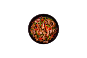 Delicious Asian teriyaki meat with red and green bell peppers