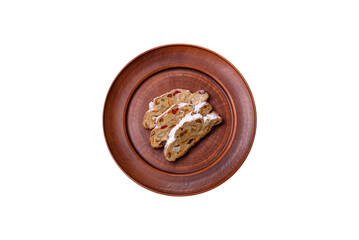Tasty christmas stollen with marzipans, dried fruits and nuts