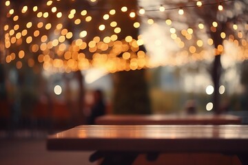 Evening outdoor cafe table display. Empty brown wooden table in front of bokeh background of shiny warm garlands. AI generative