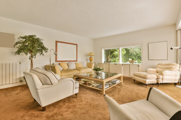 a living room with two couches, a coffee table and a plant in the photo is taken from the window