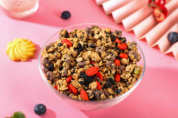 Cereal breakfast, healthy food, mixed with milk and fruits and nuts, vitamins and protein
