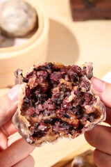 Chinese bean buns made from cereals and grains (purple sweet potato, black rice, red beans, red dates, peanuts), traditional Chinese snacks, healthy breakfast