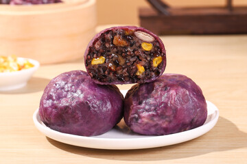 Chinese bean buns made from cereals and grains (purple sweet potato, black rice, red beans, red dates, peanuts), traditional Chinese snacks, healthy breakfast