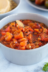 Roasted red pepper salad with garlic. Israeli cuisine concept. Vegetarian recipe