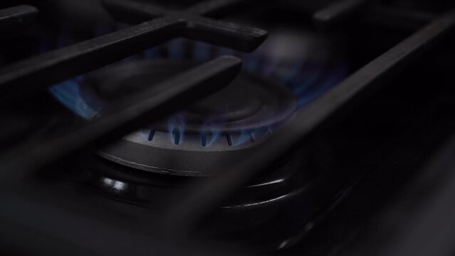 Turning on the stove in slow motion 120fps to 24fps