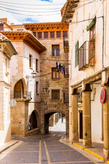 Street with historic houses in the old centre of Mora de Rubielos, Spain