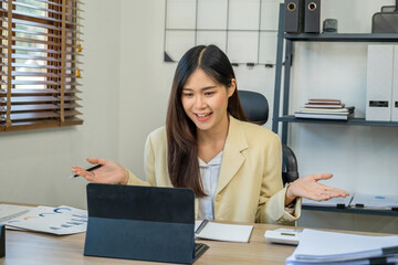 Happy cheerful cute beautiful business woman in office.
