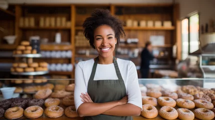 Foto op Plexiglas Happy smiling woman working at a donut and bagel store, small business owner © piknine