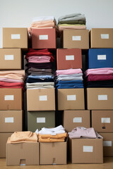 Boxes full of pre owned clothes for resale or donation