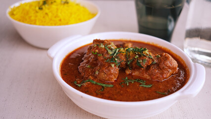 Chicken Kohlapuri is spicy Maharashtrian delicary of tender boneless chicken cooked with aromatic roasted ground spices and coconut. India food.