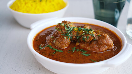 Chicken Kohlapuri is spicy Maharashtrian delicary of tender boneless chicken cooked with aromatic roasted ground spices and coconut. India food.