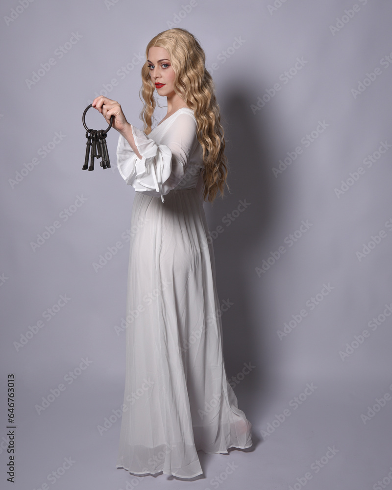 Poster Full length portrait of blonde woman  wearing  white historical bridal gown fantasy costume dress. Standing pose, facing backwards walking away from camera, isolated on studio background.