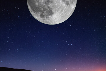 Fototapeta na wymiar Snow moon. Super full moon with dark background. Madrid. Spain. Europe. Horizontal Photography. 24. February. 2024. Moon. Supermoon. Sulfur. Conjunction. Venus. Saturn. Jupiter. Eclipse. Stars. Night.