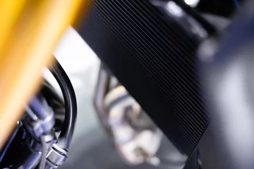 Papier Peint photo autocollant Moto Motorcycle air filter panel, blurred background