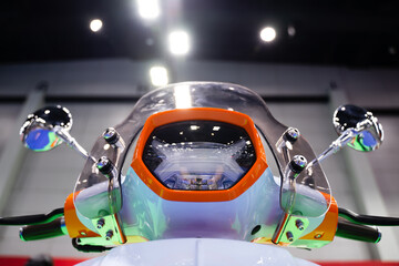 front view of modern motorcycle bokeh light background