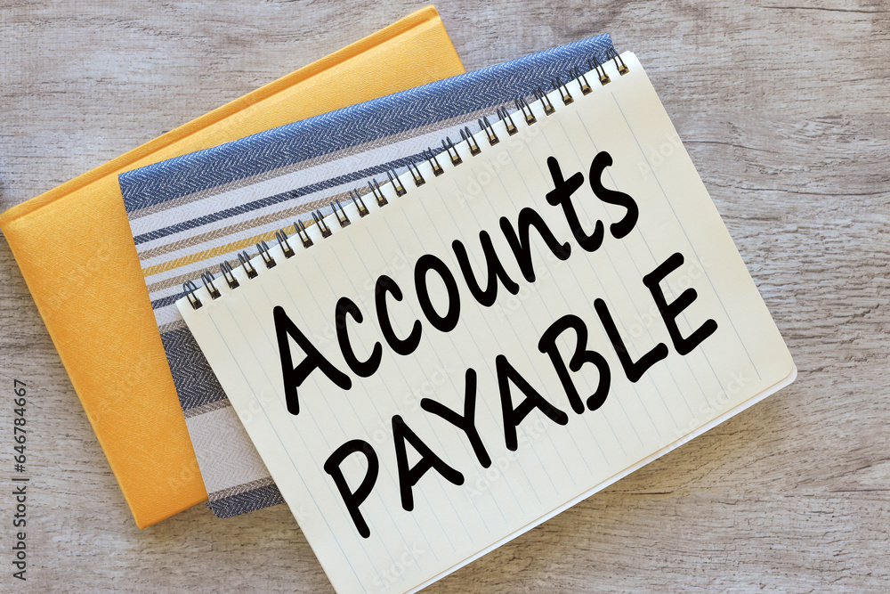Poster Business concept. ACCOUNT PAYABLE , top view of a notepad with text. notepad with spring